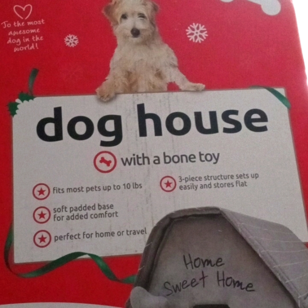 Dog house with a bone toy New